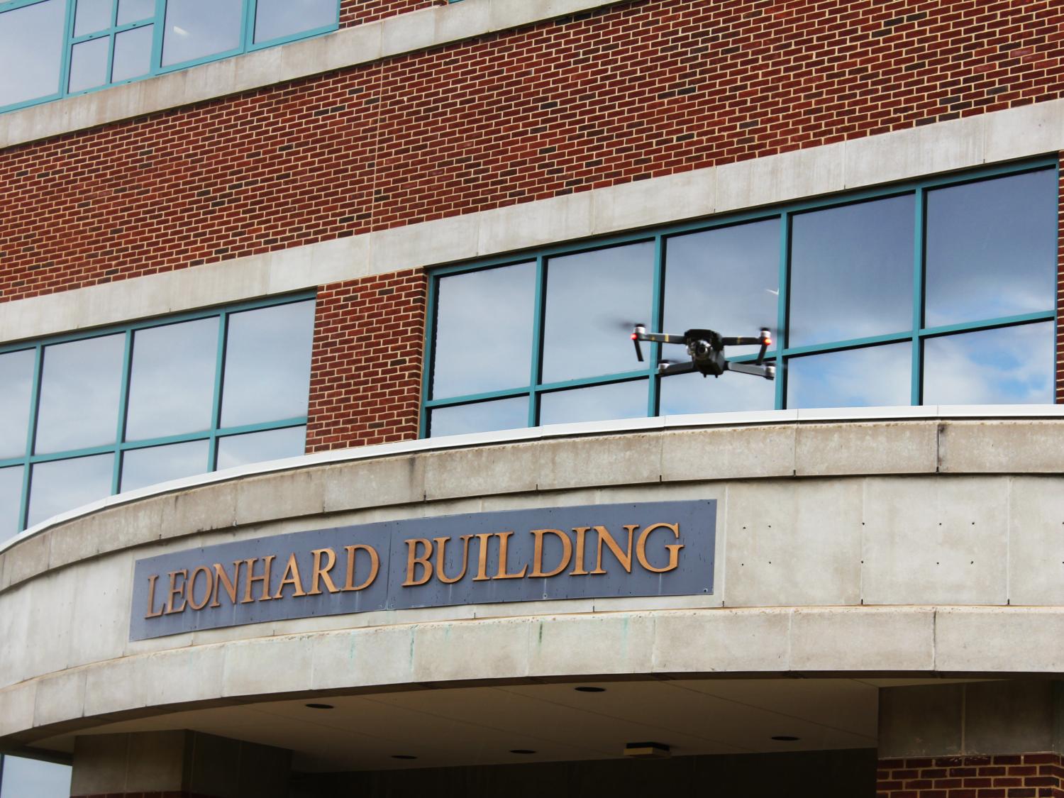 Drone hovering above the Leonhard Building 