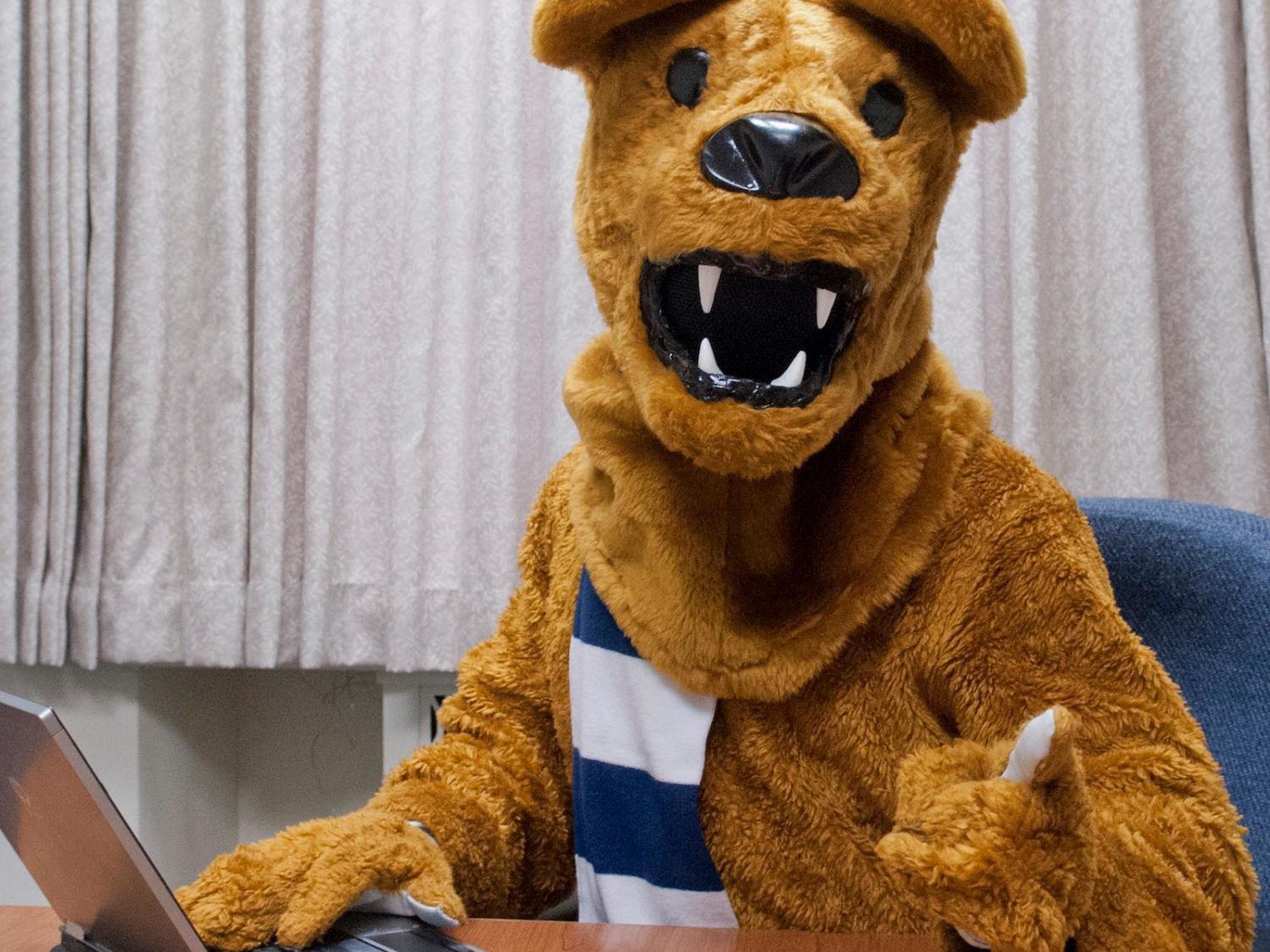 Lion with laptop photo