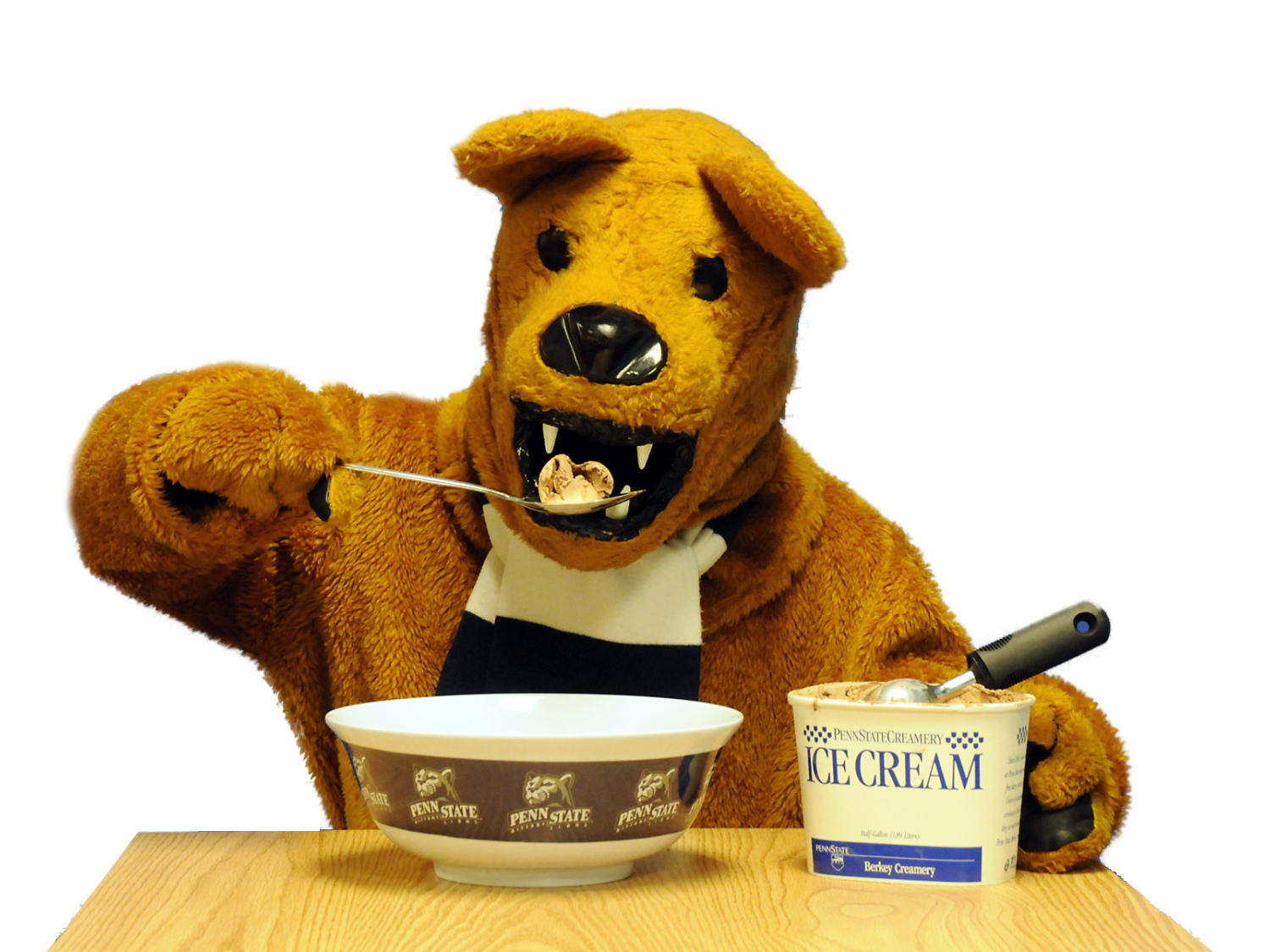 The Nittany Lion mascot digs in to a bowl of Berkey Creamery Ice Cream