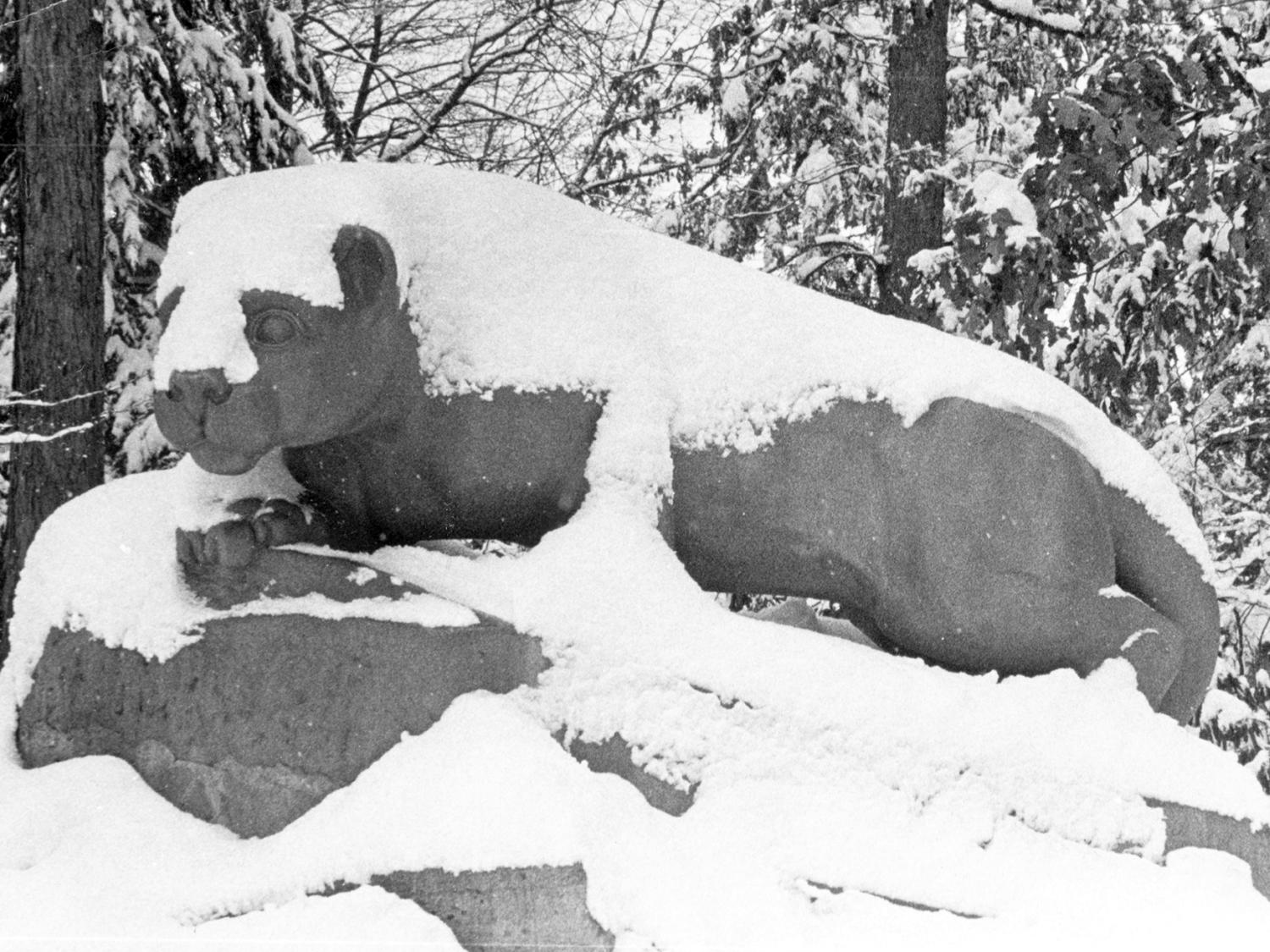 Black and white Nittany Lion Statue in the snow in 1966