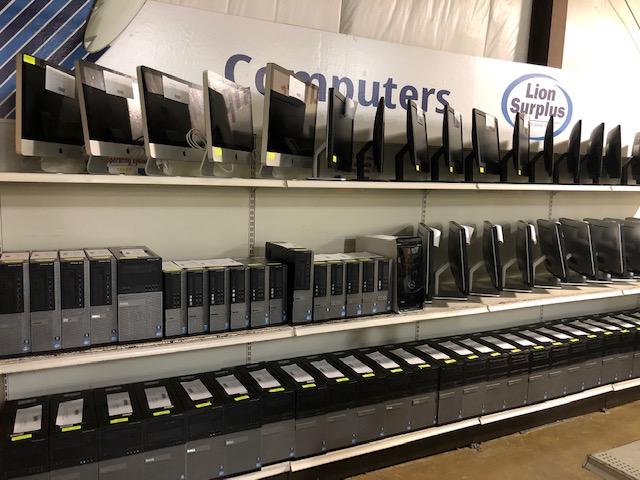 shelves of used computer equipment at Lion Surplus