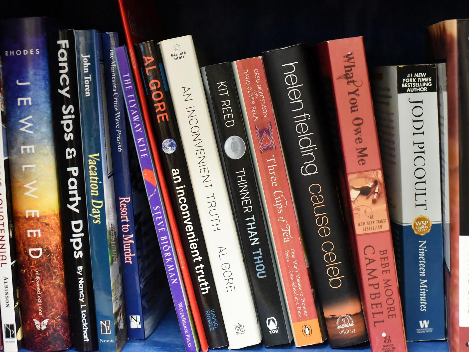 A selection of books on a shelf at Penn State Behrend