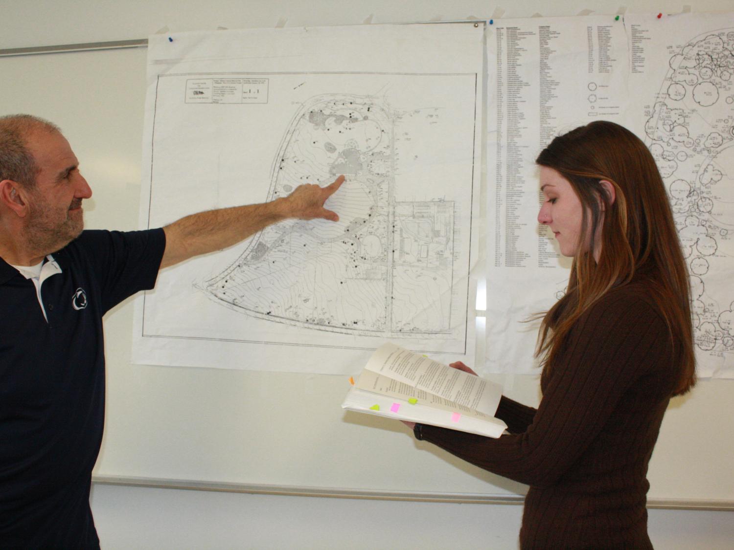 Professor Rob Loeb and graduate Taylor Walborn. 