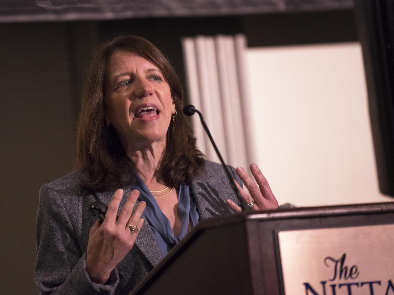Woman at podium