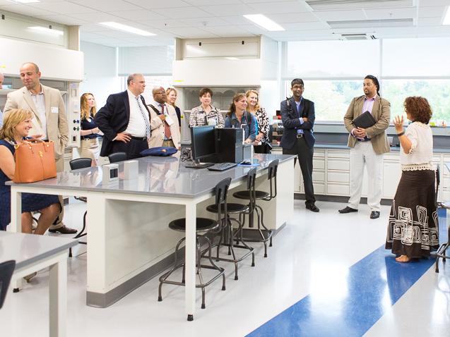 Beaver Chemistry Instructor Claudia Tanaskovic talks to a tour group in the chemistry lab.
