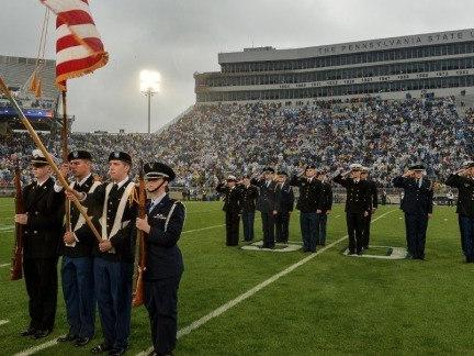 Members of the Penn State ROTC units hold the flags and observe a moment of silence at the Sept. 21 Penn State-Kent State football game.
