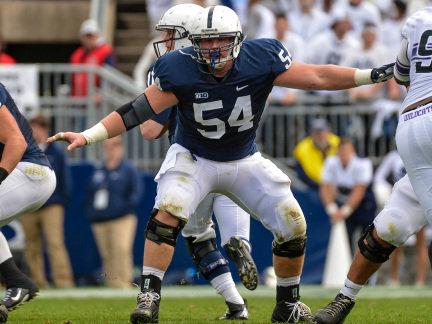 Penn State football center Matt Stankiewitch blocks against Northwestern