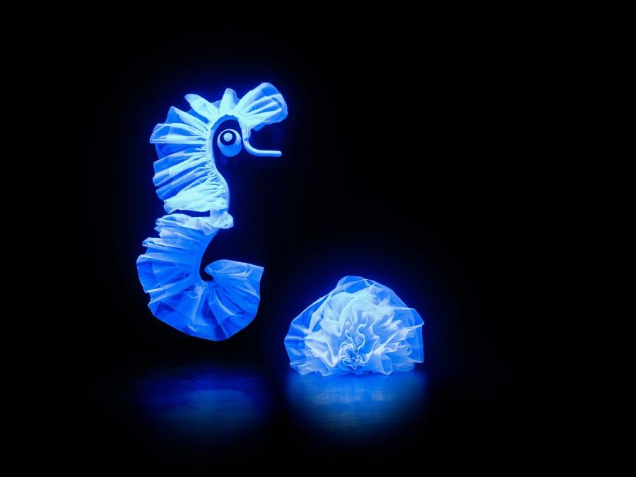 Members of Mummenschanz wear costumes made of tulle designed to resemble seahorses.