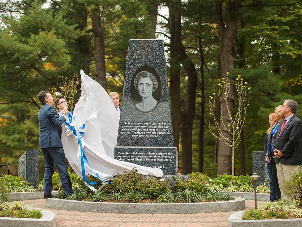Officials unveil the Mary Behrend monument at Penn State Behrend on Oct. 24.