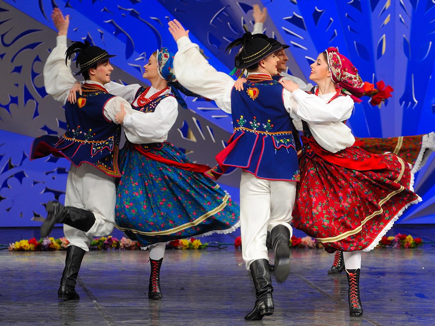 A pair of couples dance in a Mazowsze performance