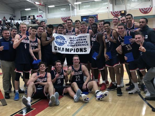 The Penn State Behrend men's basketball team celebrates its 2019 AMCC championship victory.