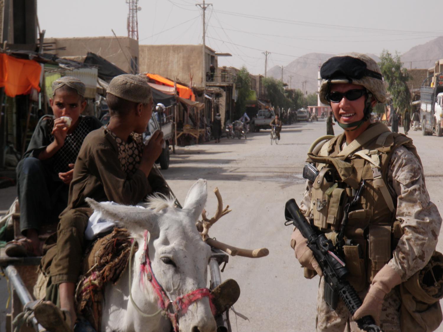 Marine Corps Staff Sgt. Juliana Mercer is shown on patrol in Helmand Province, Afghanistan.