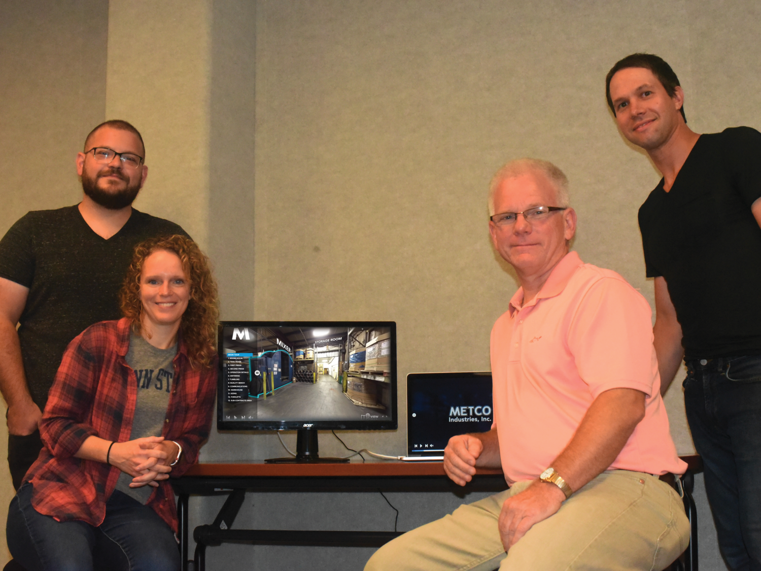 David Perkins, far left, Jodi Herman, and Jaimen Gallo, far right, are three members of Penn State Behrend’s Centers for Teaching and eLearning Initiatives, who recently developed a 360-degree virtual tour of Metco Industries.