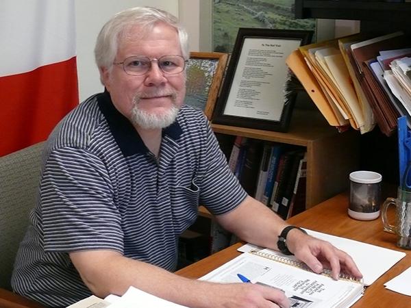 C. Michael Comiskey, associate professor of political science, retires from Penn State Fayette.