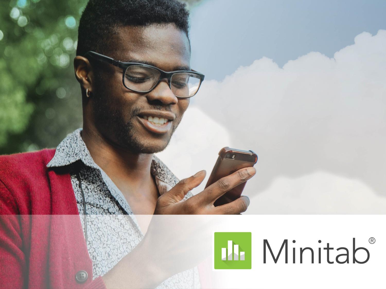 male student scrolling through his cellphone with Minitab logo overlay