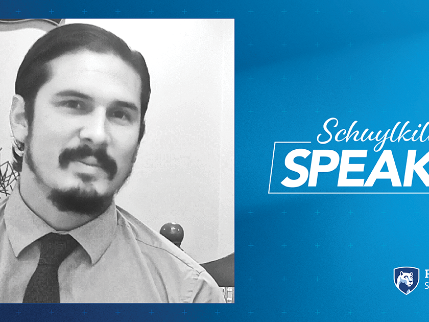 Black and white photo of Mitchell Stokes on blue background with text that reads "Schuylkill Speaks!" with the Penn State Schuylkill logo