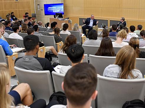TE Connectivity Chief Financial Officer Heath Mitts, left, talks with Penn State Smeal College of Business Dean Charles H. Whiteman.