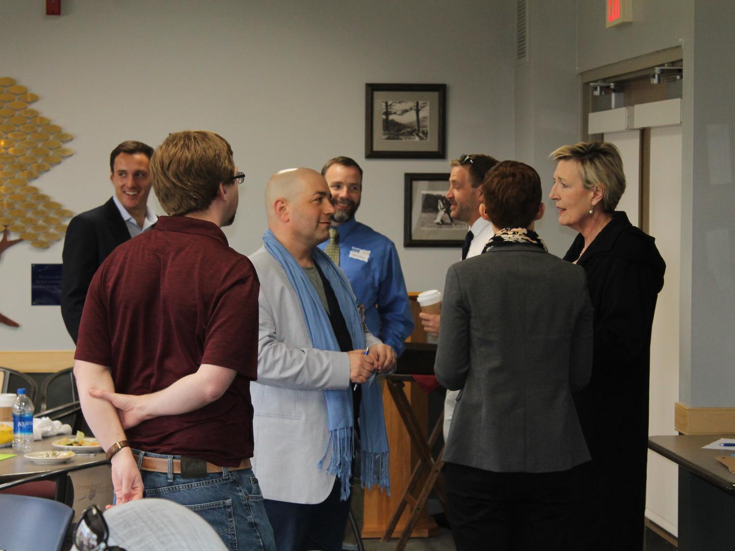 Penn State faculty, staff and students talk with representatives from Lightsource BP about ideas for the new solar array