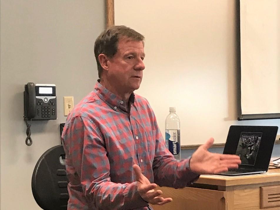 Photographer Mike Mullen telling students of his experiences in the field