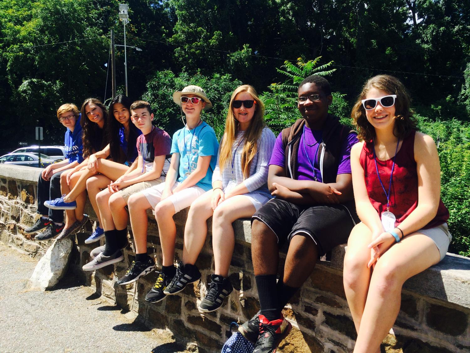A group of eight high school students pose while at Musikfest.