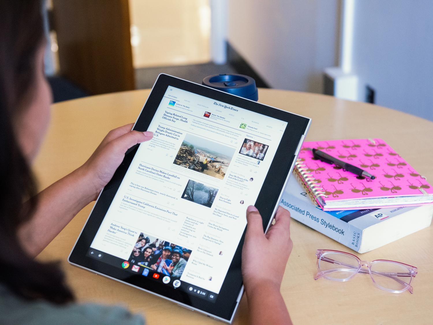 student reading the New York TImes on a tablet