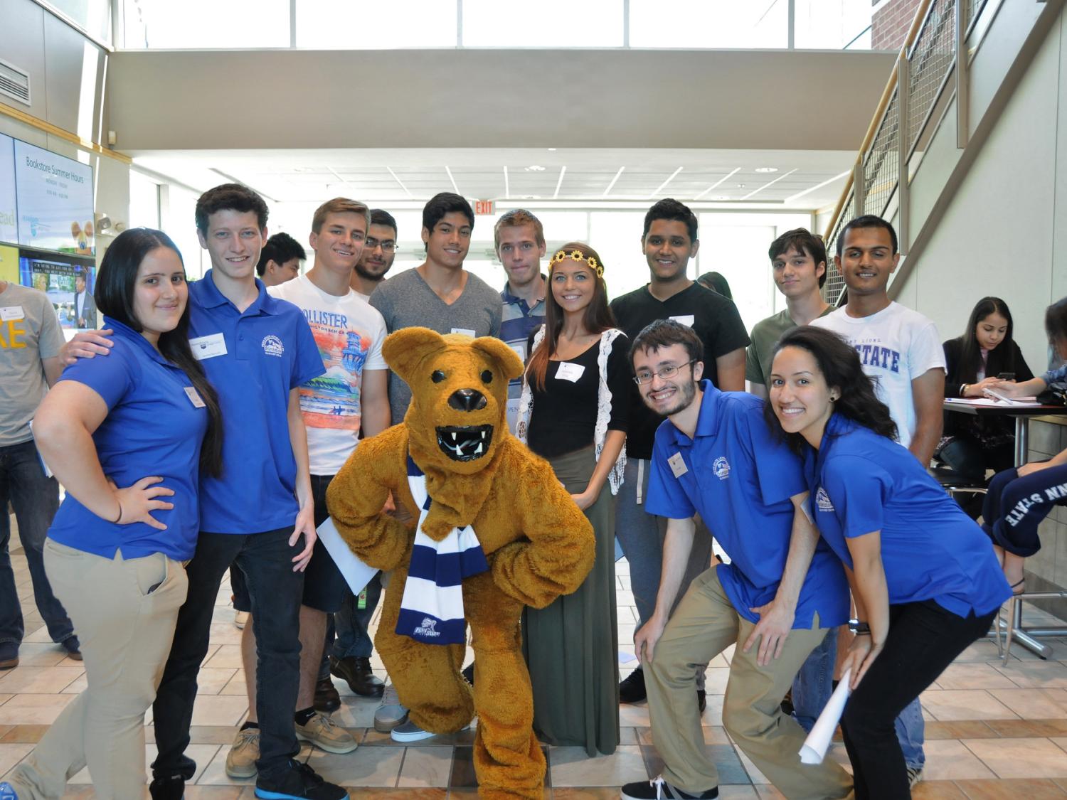 Students gather with Nittany Lion in Centre Hall.