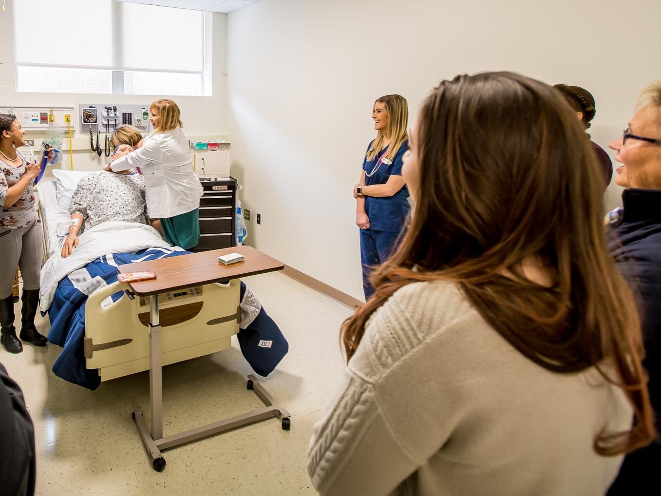 Visitors tour the new nursing simulation labs at Penn State Behrend