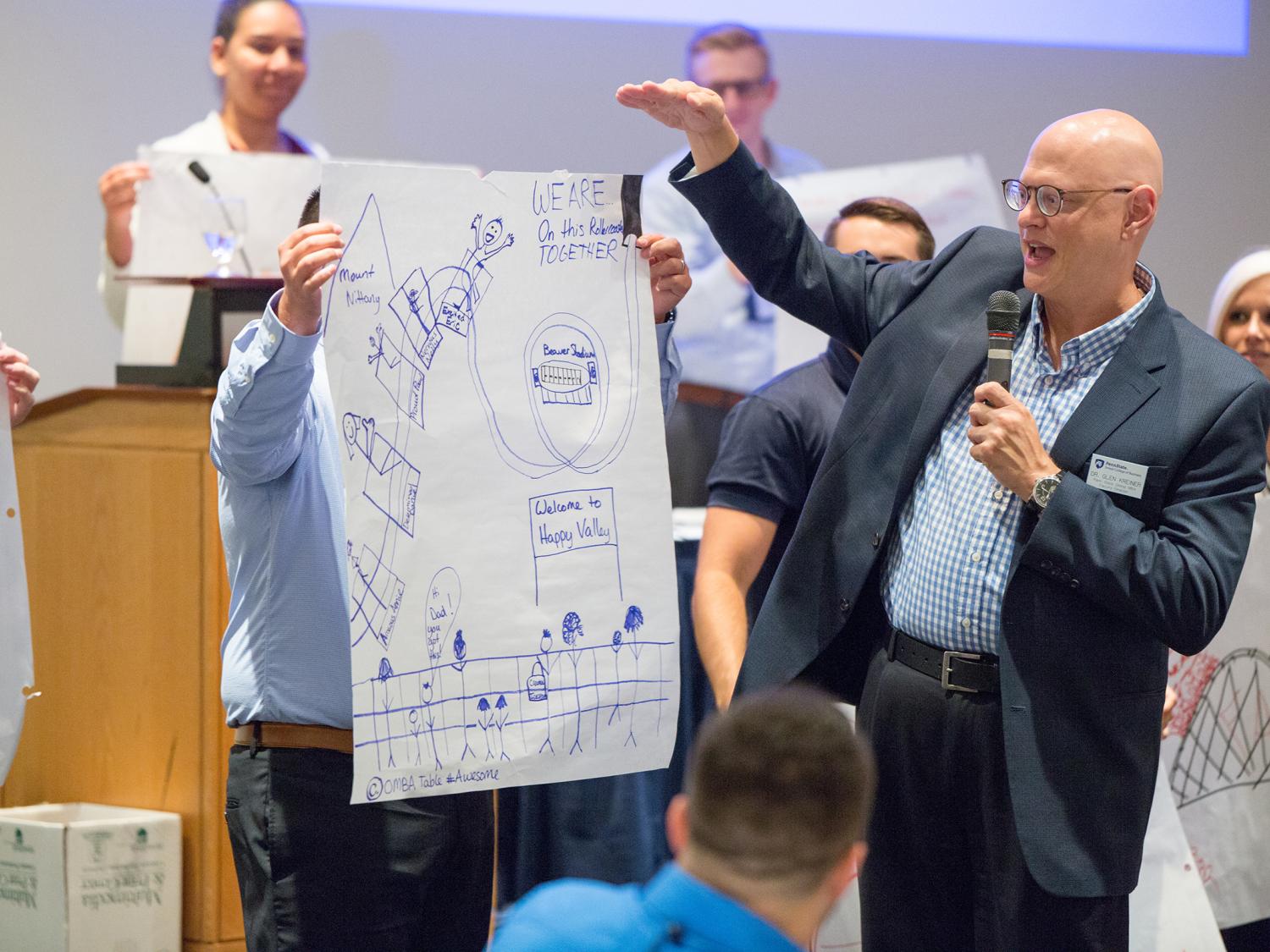 Penn State Online MBA Faculty Chair Glen Kreiner evaluates a project.