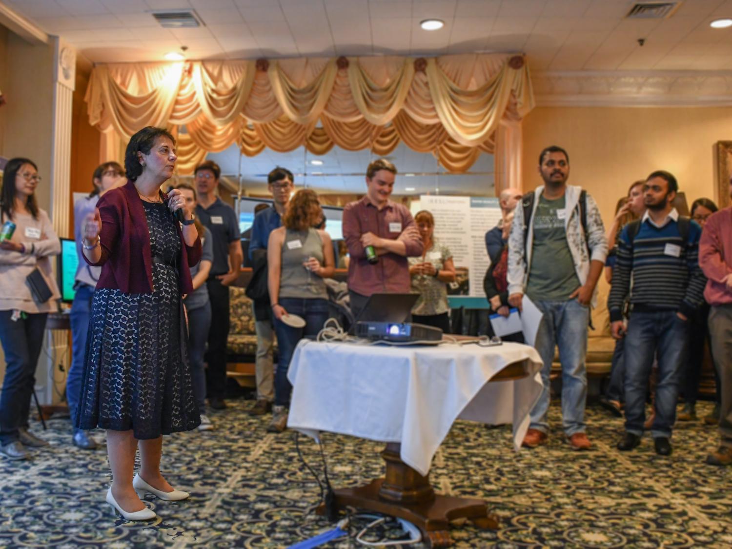 Odette Mina addresses the crowd at the 2018 EESL Open House.