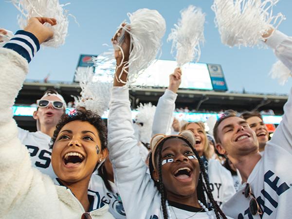 Penn State students cheering at the white out game