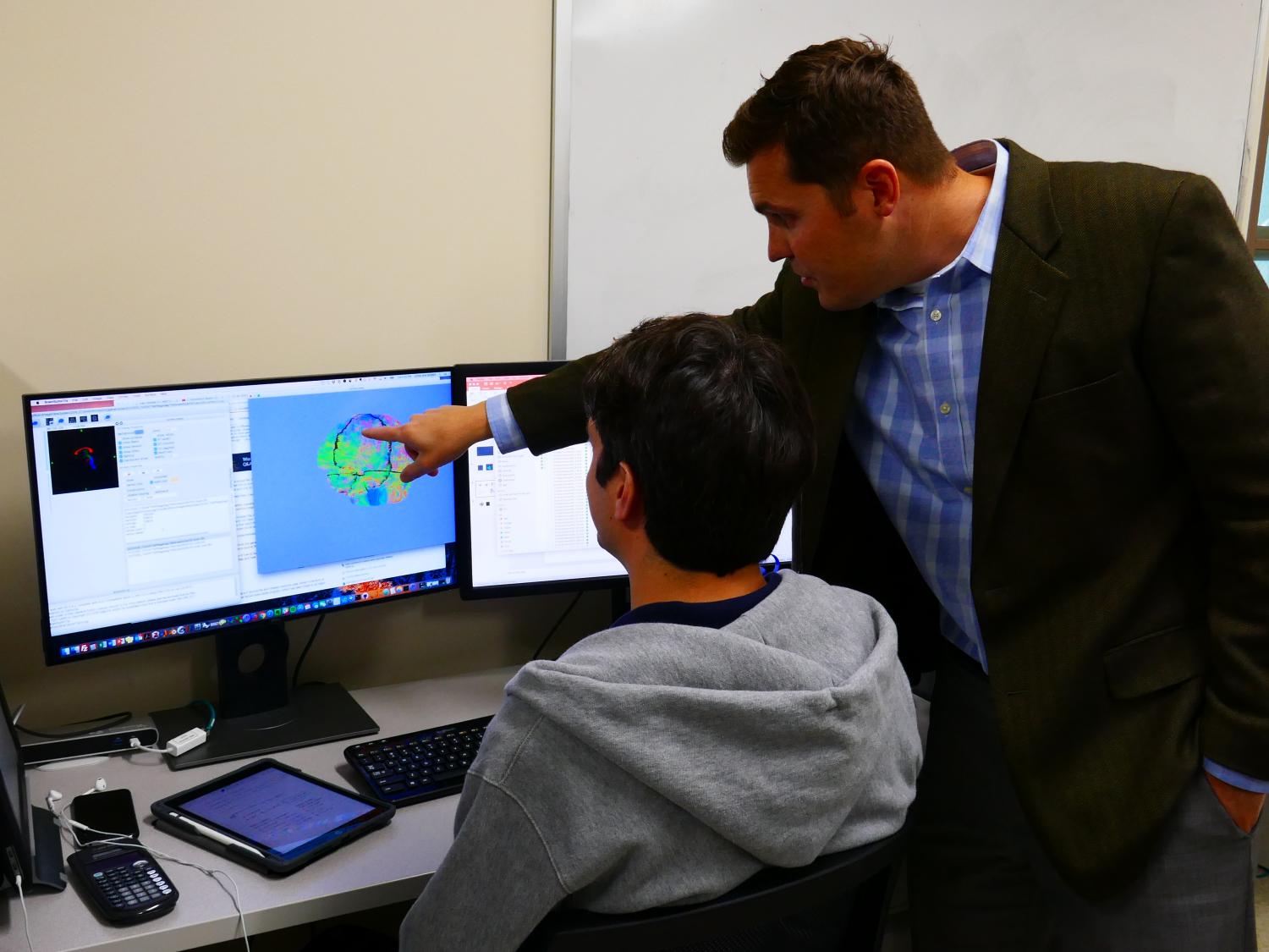 Reuben Kraft instructs graduate student