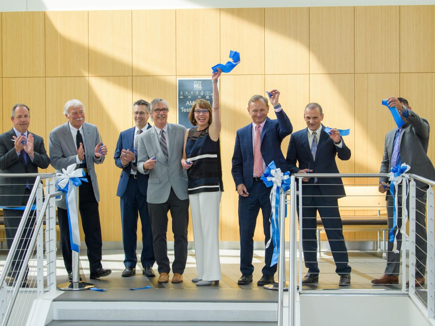 Behrend Chancellor Ralph Ford and other partners cut the ribbon to open the new translational research lab at Penn State Behrend.