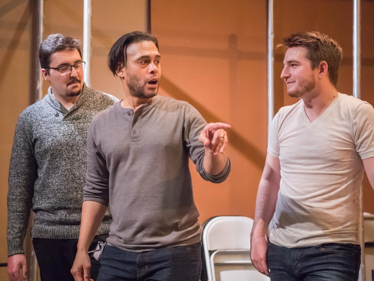Wilson Jermaine Heredia, center, coaches students Logan Saborsky, left, and Jaret Kelly during a visit to Penn State Behrend's Studio Theatre last month. 