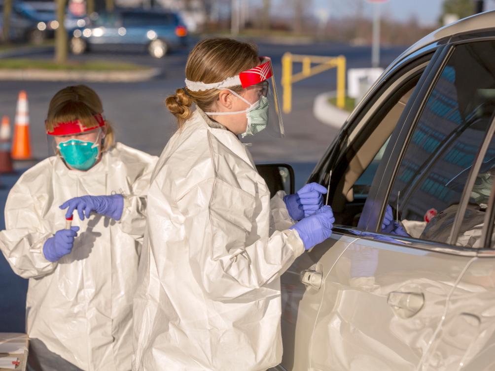 Two nurses wearing personal protective equipment 