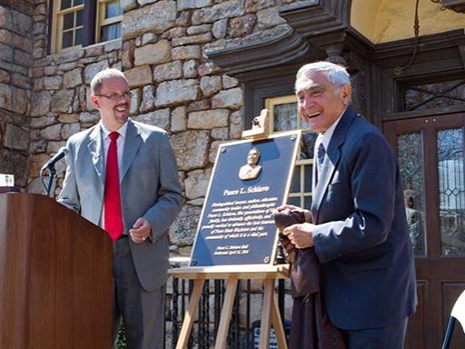 University benefactor Pasco Schiavo, right, has endowed the Pasco L. Schiavo Open Doors Scholarship. Chancellor Gary Lawler is at left during the naming of the Penn State Hazleton administration building in Schiavo's honor in 2014.
