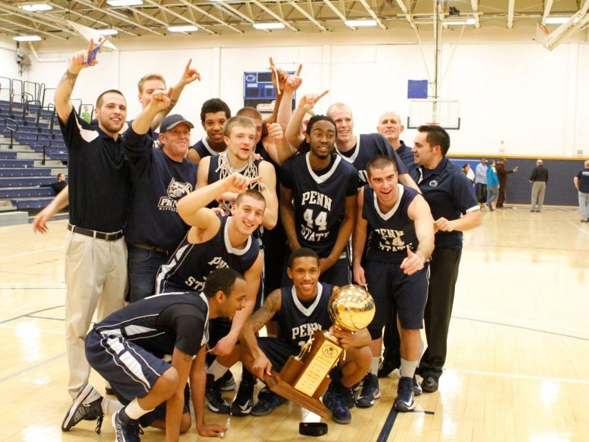 York basketball players pose with trophy