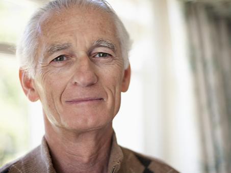 A man looks into the camera.