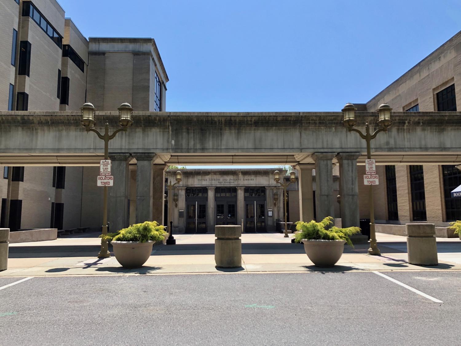 exterior photo of library building showing empty curbside short-term parking