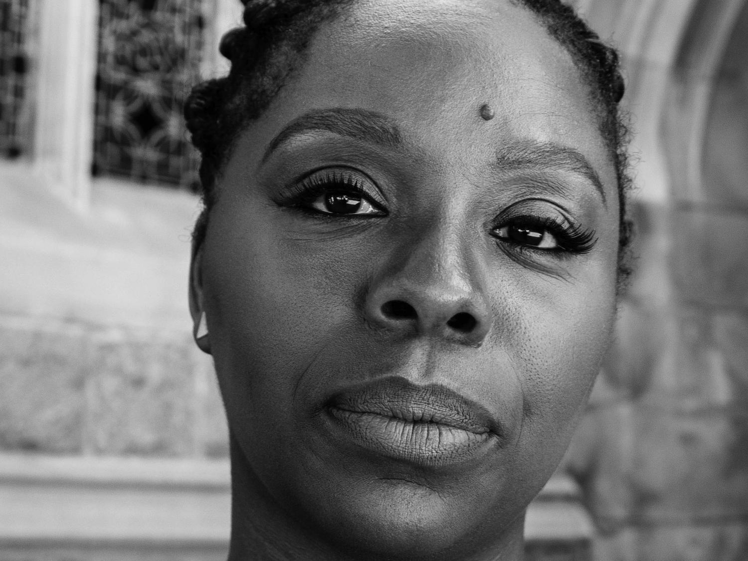 A black-and-white photo of Patrisse Cullors, co-founder of the Black Lives Matter movement
