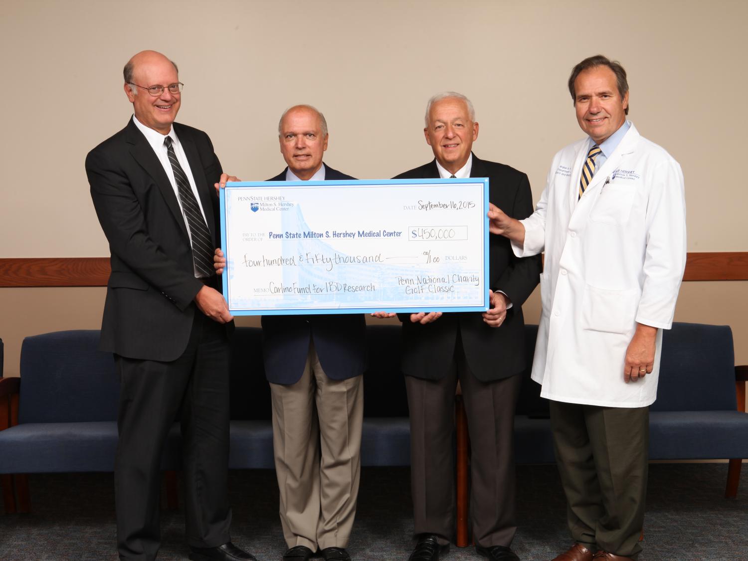 Representatives of Penn State Hershey and Penn National Gaming.