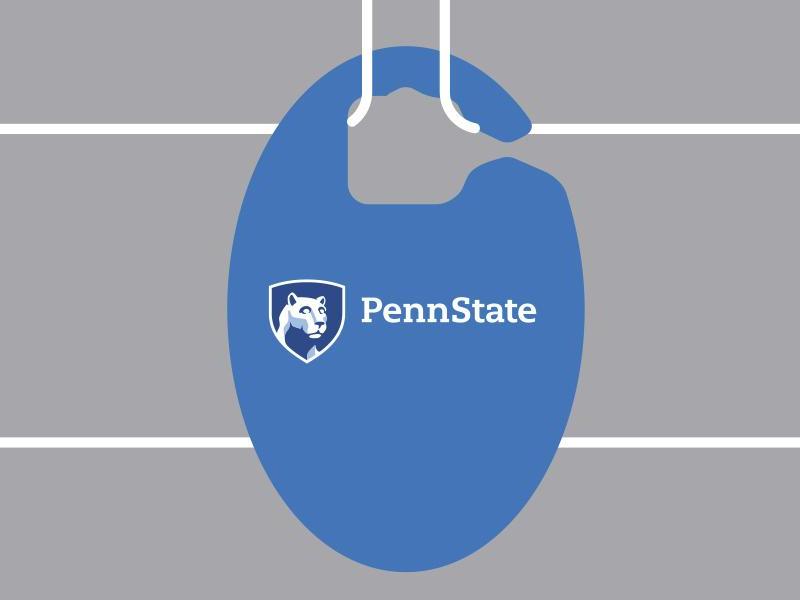 A blue Penn State parking permit against a gray background. 