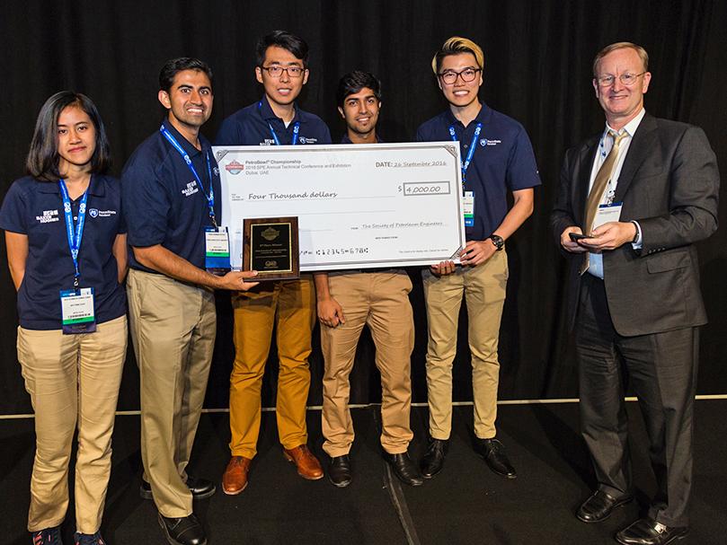 Penn State Petrobowl teammates Nur Syamieza, left, Venkat Putcha, Wei Liu, Nirjhor Chakraborty and Liyang Liu accept their 3rd place award.