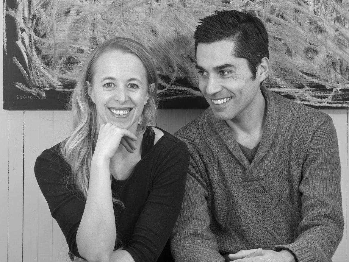 Sofia von Ellrichshausen and Mauricio Pezo sitting in front of abstract drawing