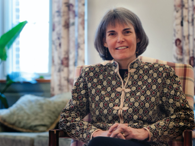 Susan McHale sitting in chair