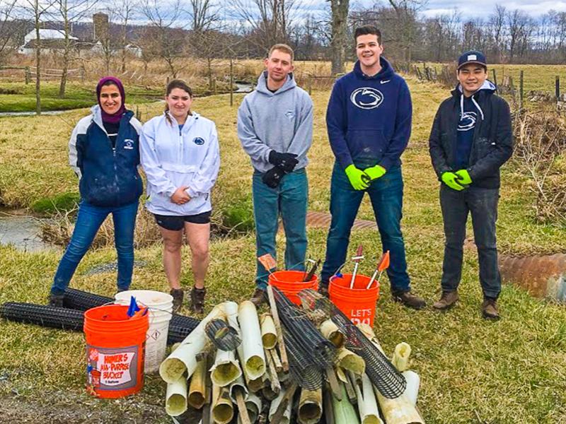 Positive Energy cleans up local riparian buffer zone