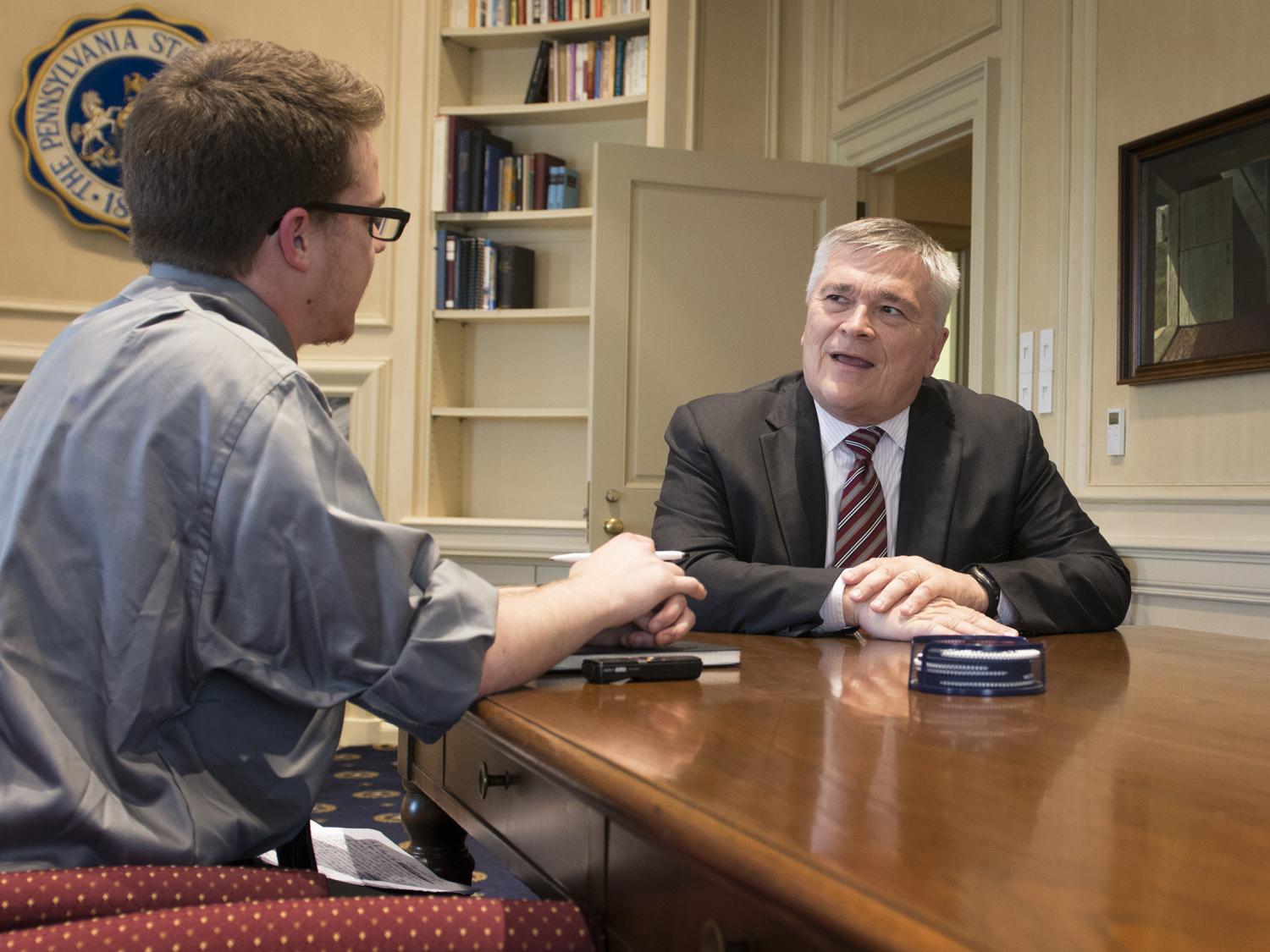 President Barron with Collegian reporter