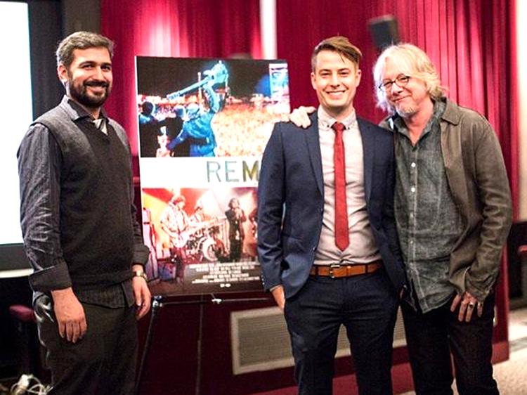 Alumni film producers Dave Leopold and Alex Young with Mike Mills of R.E.M.
