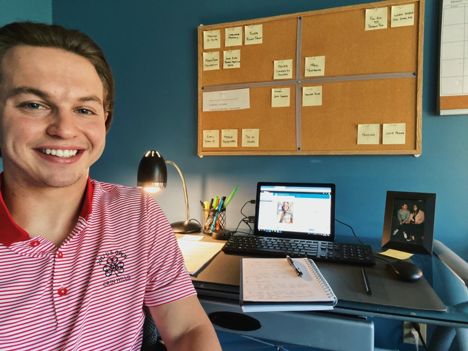 Zachary Rall sitting in his home office