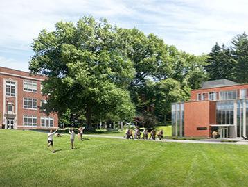 architectural rendering of building with students on the green 