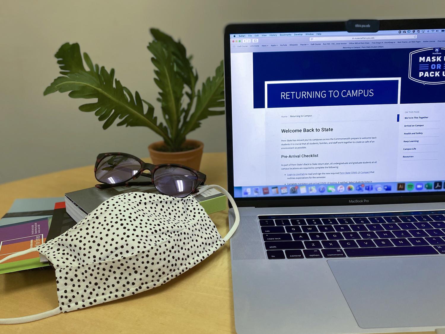 Photo of laptop with Return to Campus Student Guide visible